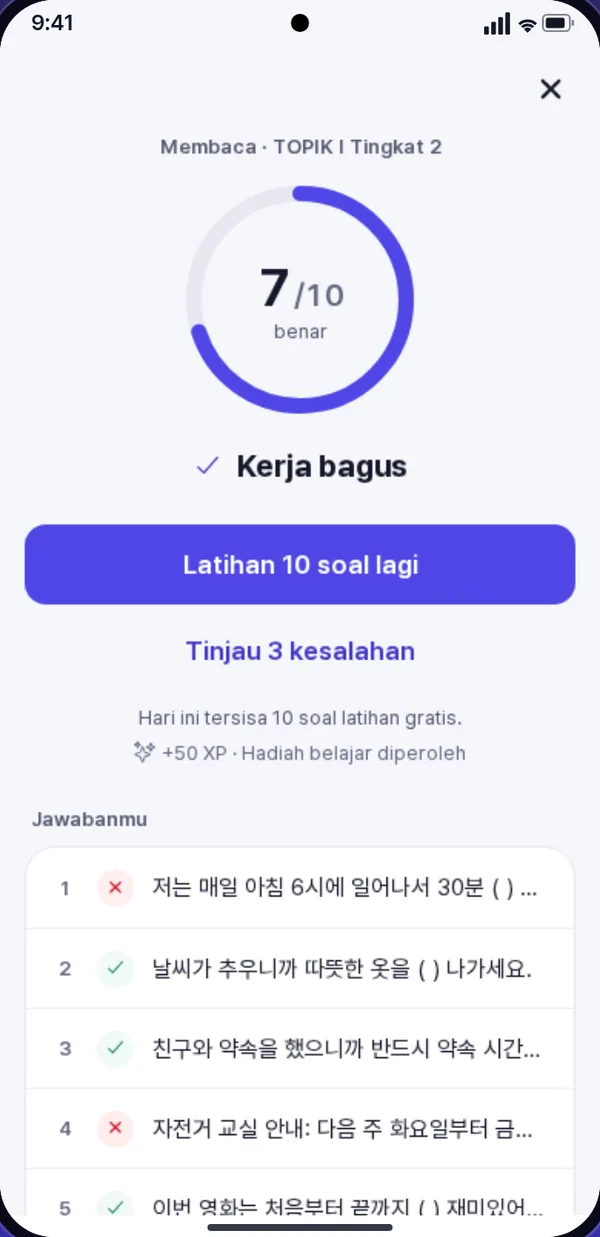 Layar hasil dengan 7 dari 10 benar dan daftar jawaban yang ditandai benar atau salah